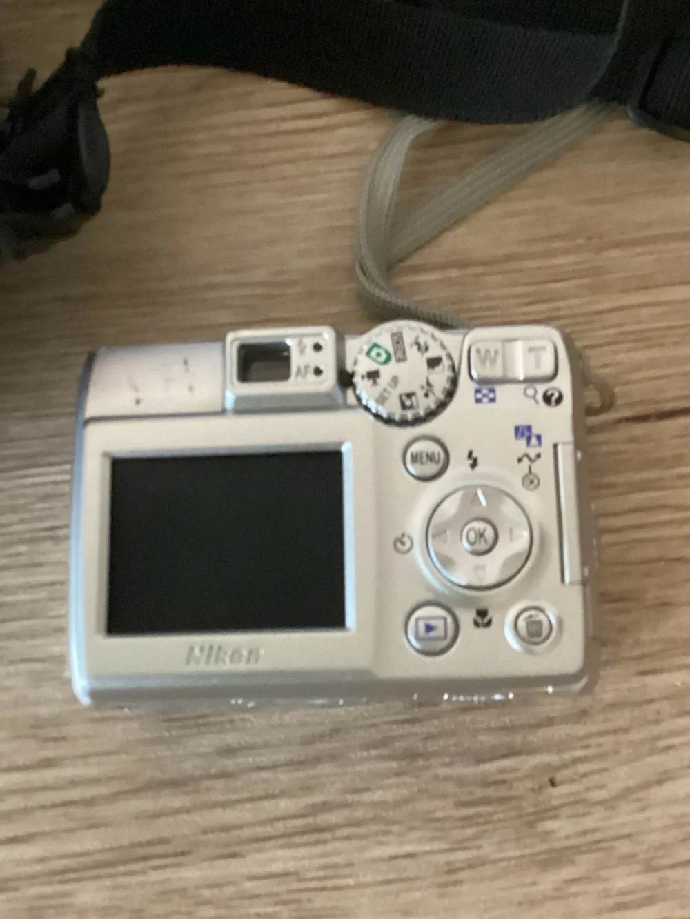 Nikon Silver Compact Digital Camera with Black Carrying Pouch